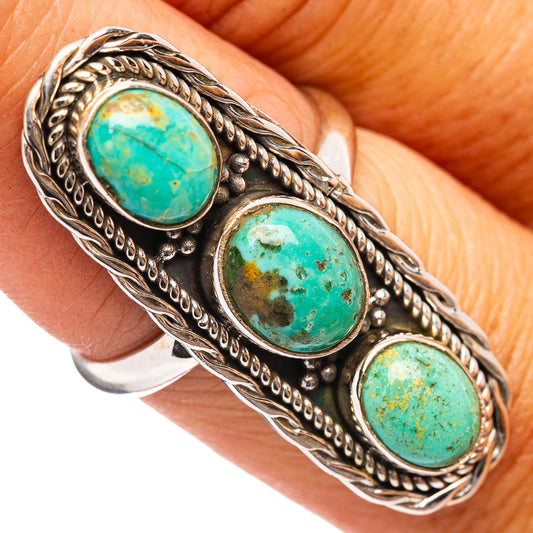 Turquoise cabochon ring with three oval stones, sterling silver setting with rope border