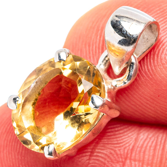 Citrine faceted oval pendant with prong-set stone and sterling silver bail