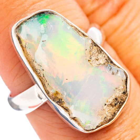 Sterling silver opal ring with oval raw Ethiopian opal, prong bezel setting