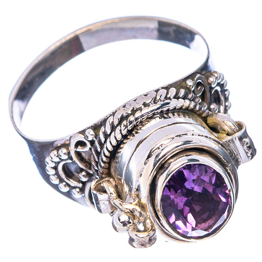 Sterling silver ring with purple amethyst stone and detailed swirling side setting