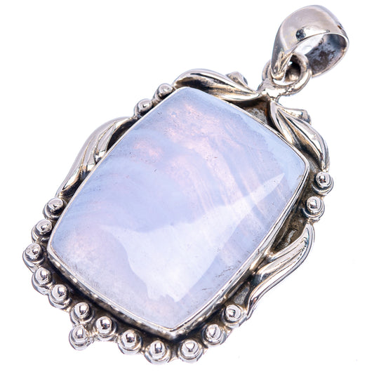 Sterling silver lace agate pendant with rectangular blue stone and ornate beaded bezel