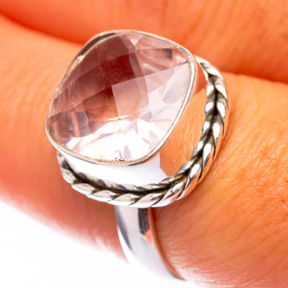 Sterling silver ring with oval pink rose quartz gemstone and rope-twist bezel