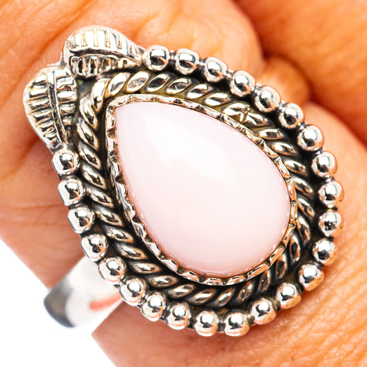 Pink oval opal sterling silver ring with beaded textured band