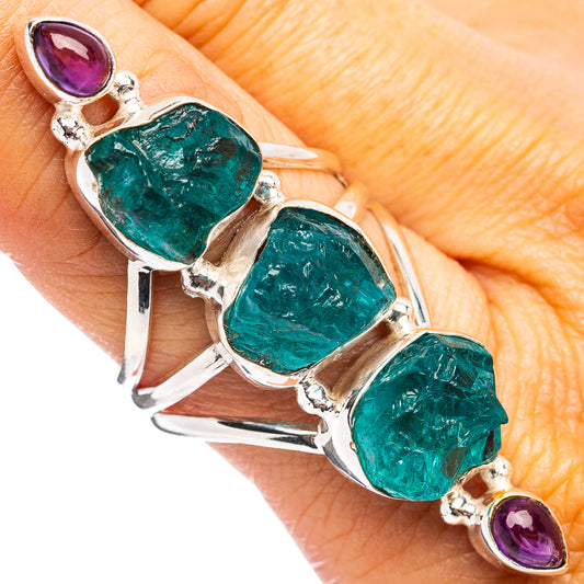 Sterling silver ring with three green teardrop stones and two purple amethyst accents