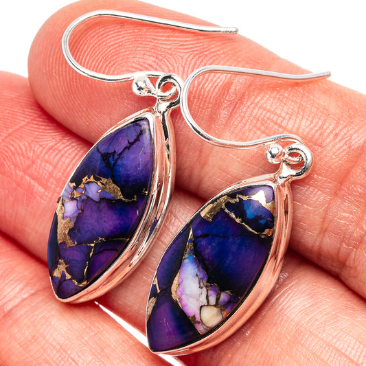 Sterling silver teardrop earrings with purple-blue inlay stone, fishhook backs