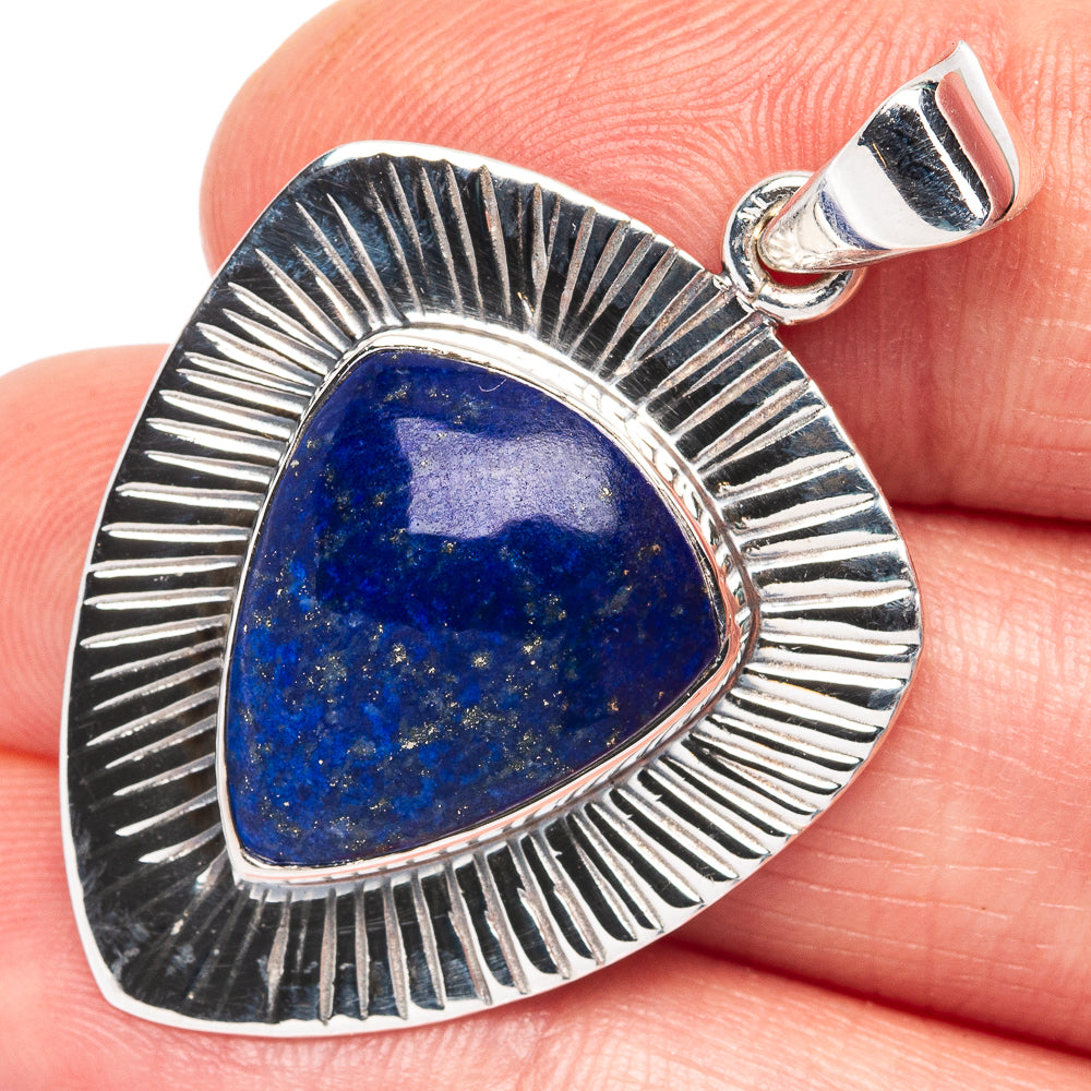 Lapis lazuli teardrop pendant in 925 sterling silver with sunburst border