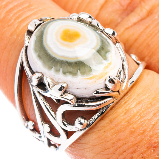 Sterling silver ring with oval ocean jasper cabochon and ornate prong setting