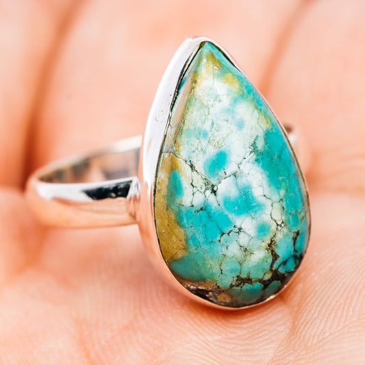 Sterling silver turquoise gemstone ring with teardrop stone and visible band profile