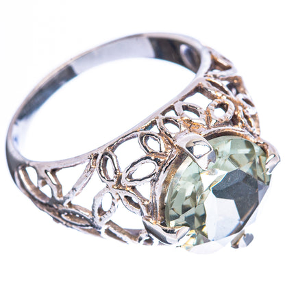 Sterling silver filigree ring with large faceted green amethyst and side prongs