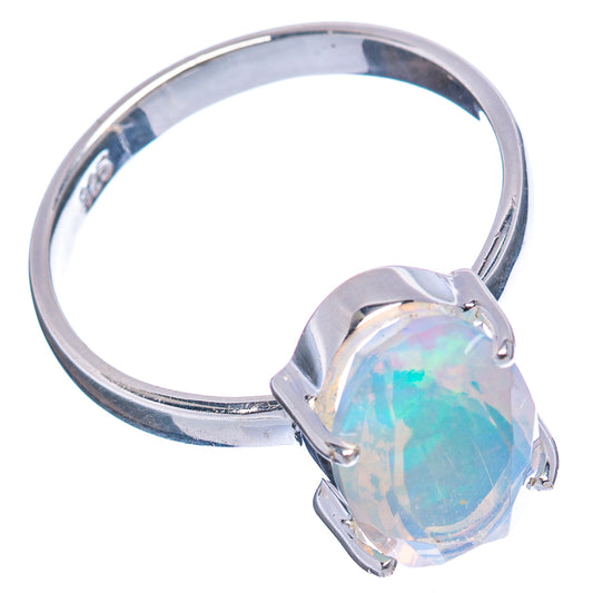 Sterling silver oval opal ring with prong-set opal showing blue-green iridescence