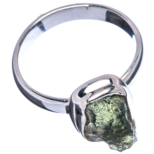 Sterling silver ring with raised rough green gemstone, openwork bezel detail
