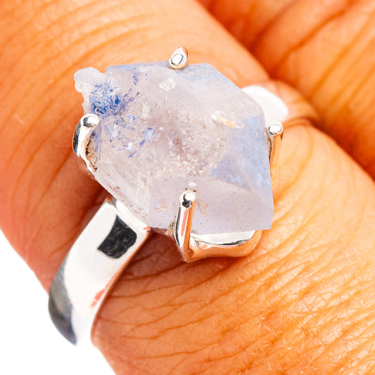 Sterling silver ring with faceted light blue quartz slice and prong setting