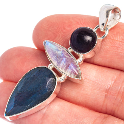 Sterling silver pendant with amethyst, moonstone, and blue labradorite teardrop stones