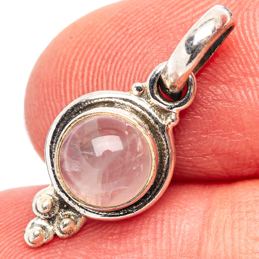 Rose quartz pendant in .925 sterling silver, round pink cabochon with ornate frame