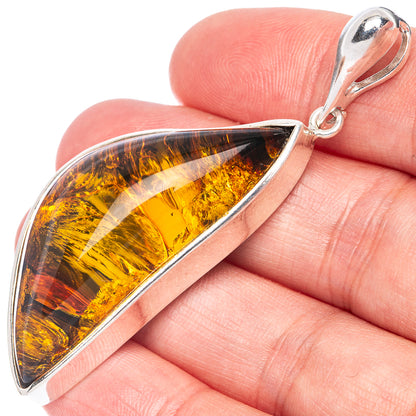 Sterling silver pendant with teardrop Baltic amber stone and polished bail