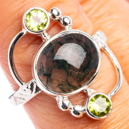 Sterling silver ring with oval green moss agate and three peridot-like green stones