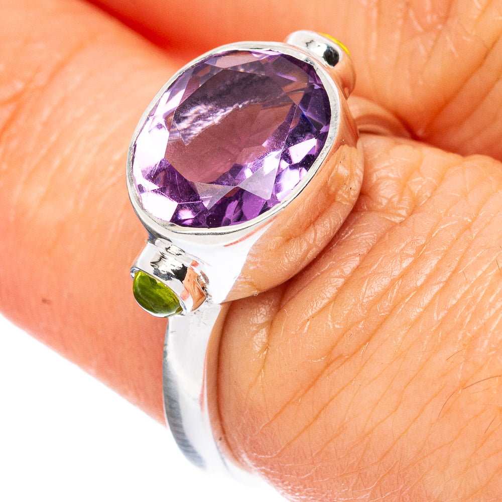 Amethyst faceted oval ring with green accent stones on 925 sterling silver band