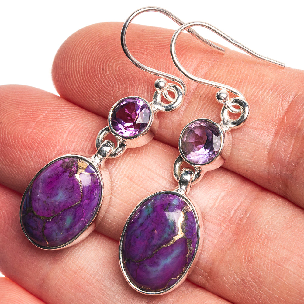 Purple gemstone earrings showing oval and round stones on silver links