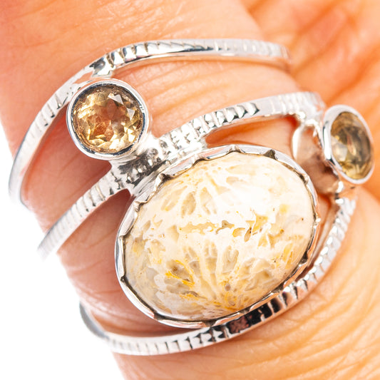Sterling silver ring with oval fossil coral cabochon and small round citrine stone