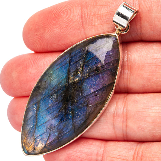 Labradorite pendant with oval .925 sterling silver bezel and blue-gold iridescent stone