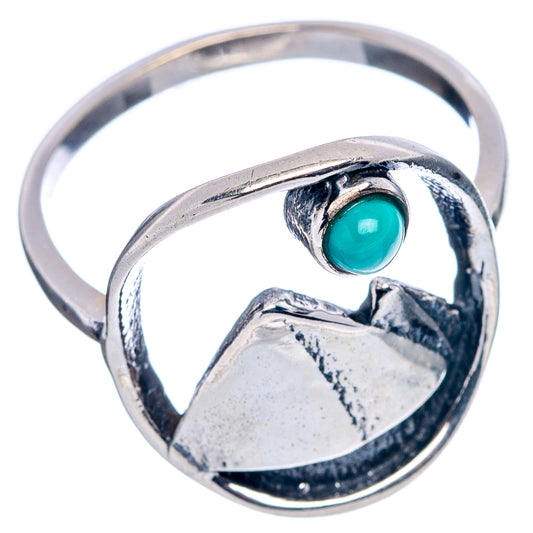 Sterling silver dainty ring with turquoise oval cabochon and textured heart setting