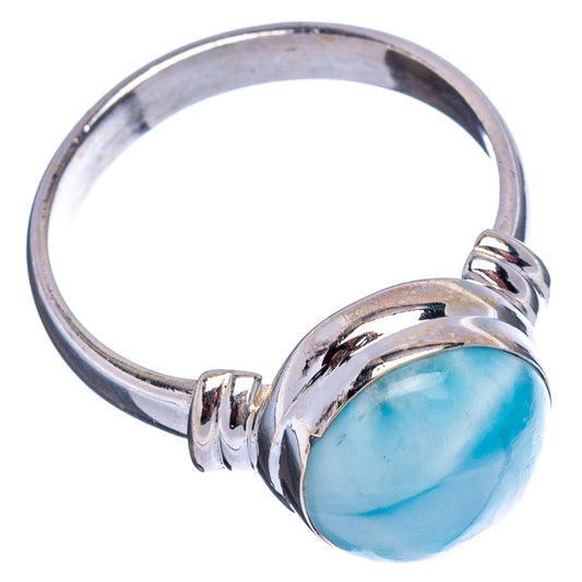 Sterling silver ring with round blue larimar cabochon and open twisted band