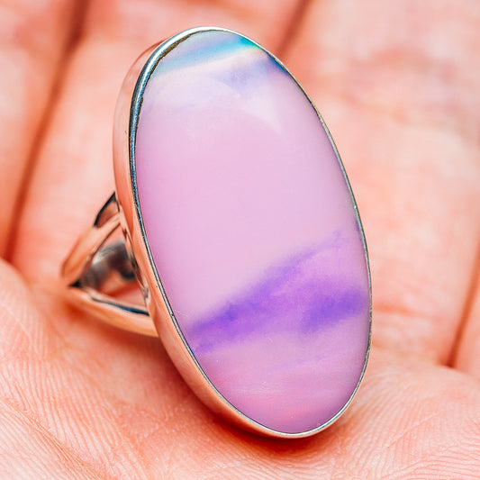 Oval pink-purple opal ring in .925 sterling silver, polished bezel side view