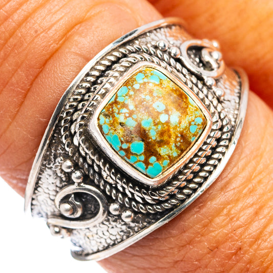 Turquoise cabochon silver ring with ornate rope and beadwork bezel