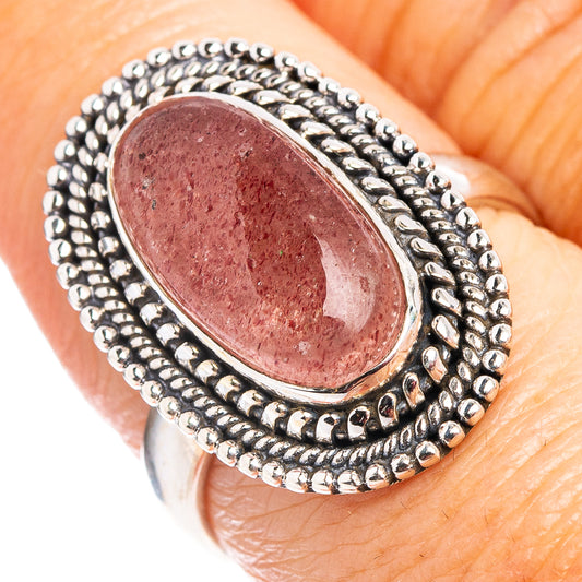 Size 7.5 sterling silver sunstone ring with oval red stone and beaded border