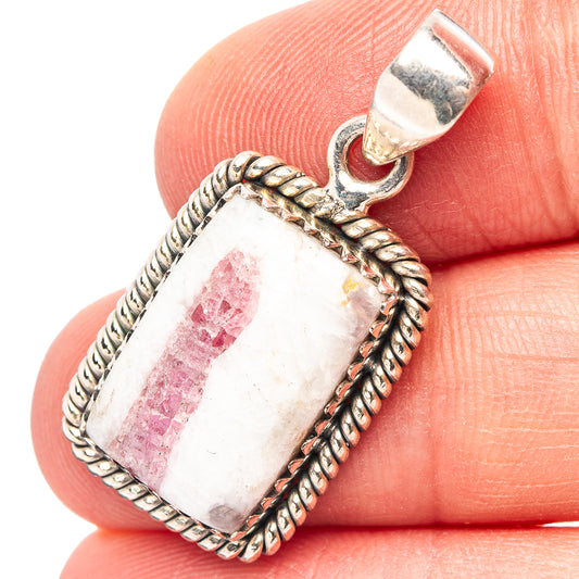 Pink tourmaline quartz pendant in sterling silver rope bezel with rectangular crystal