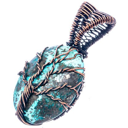 Turquoise teardrop tree-of-life pendant in oxidized copper wire wrap, angled view