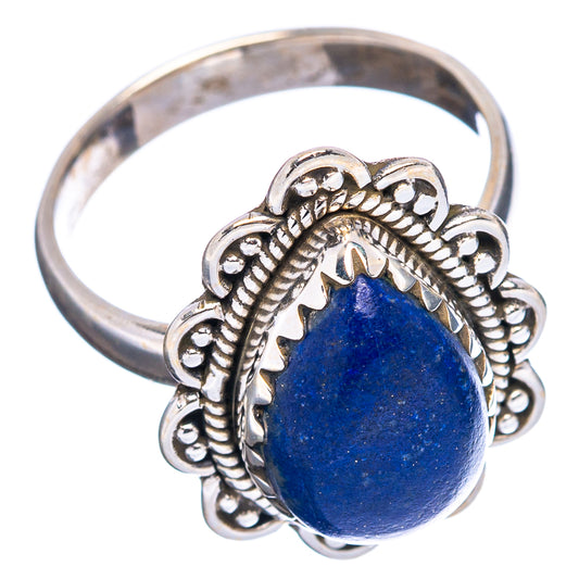 Sterling silver ring with rose quartz cabochon, ornate band and blue teardrop stone