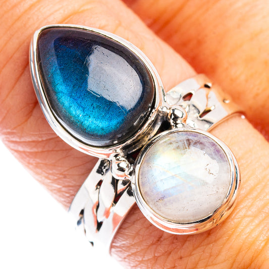 Sterling silver ring with blue labradorite teardrop and round rainbow moonstone center
