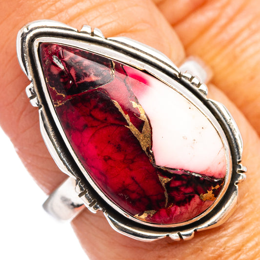 Sterling silver ring with red marbled oval cabochon and raised bezel