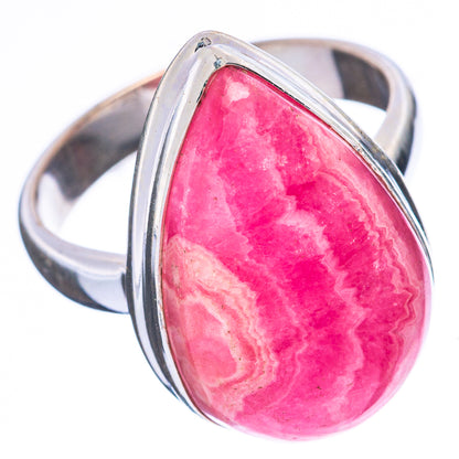 Pink oval rhodochrosite cabochon set in a 925 sterling silver ring, size 7