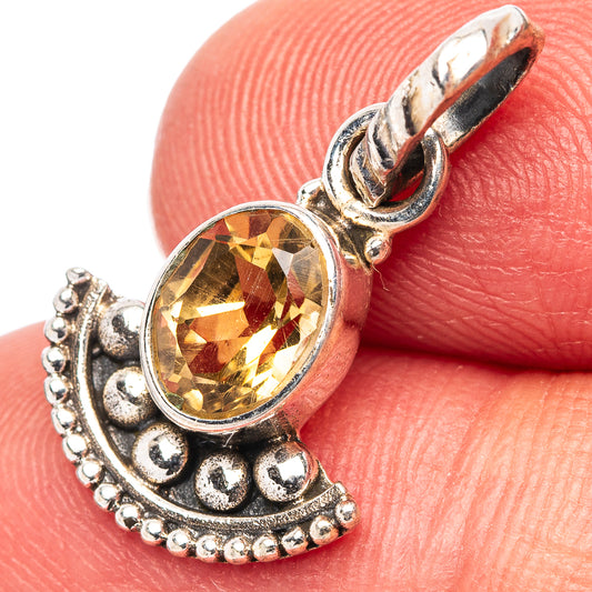 Sterling silver citrine pendant with round faceted gemstone and ornate crescent bail