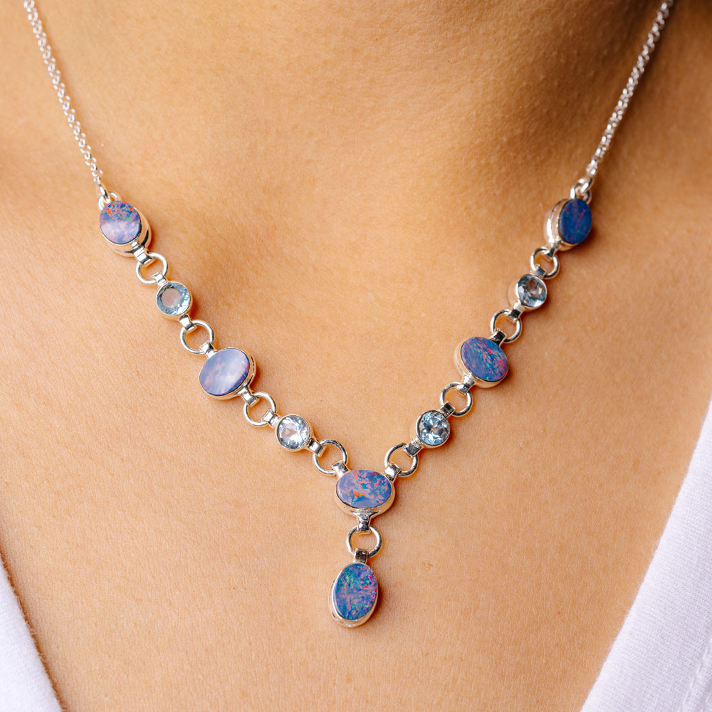 Sterling silver necklace with linked chain and blue opal doublet oval stones