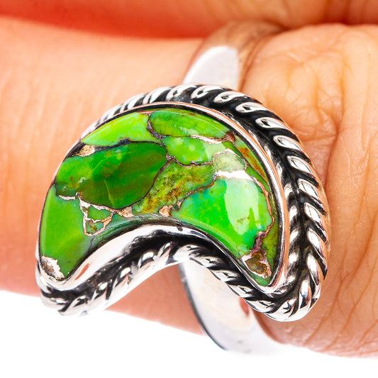 Green turquoise cabochon moon ring with braided silver-toned band, ornate bezel