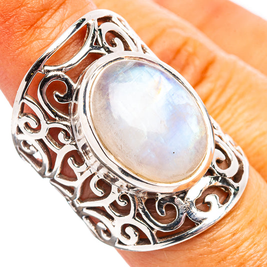 Sterling silver moonstone ring with oval opalescent stone and filigree setting