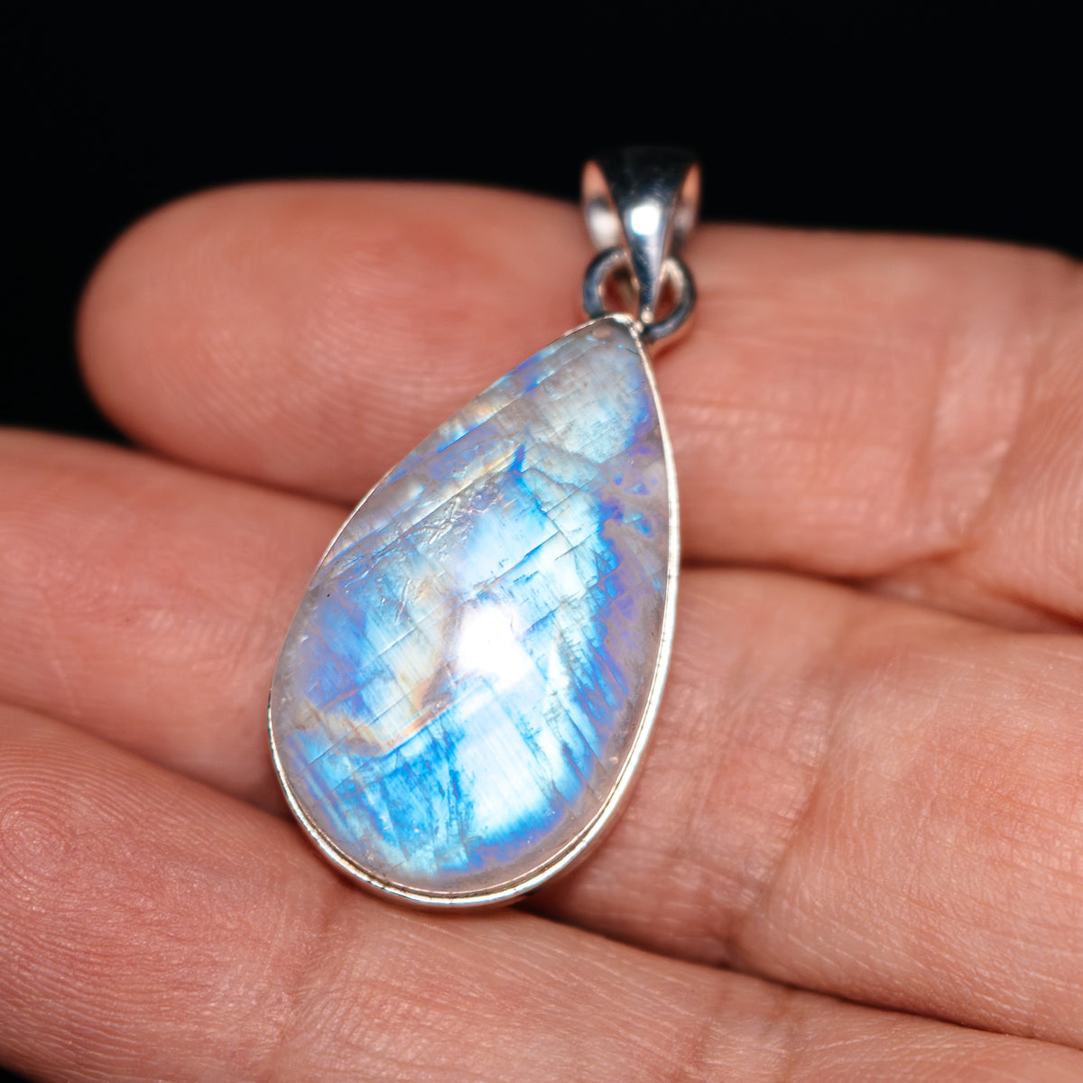 Sterling silver teardrop pendant with blue rainbow moonstone gemstone