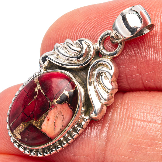 Sterling silver pendant with oval red stone cabochon and ornate bail, 1 1/4 in
