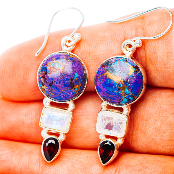 Sterling silver drop earrings with round purple-blue gemstone, moonstone, and garnet drops