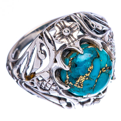 Sterling silver ring with turquoise cabochon and carved band with decorative motifs