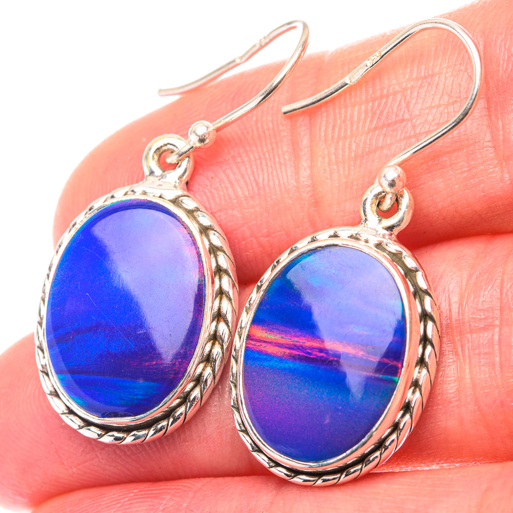 Sterling silver oval opal drop earrings with blue cabochon stones