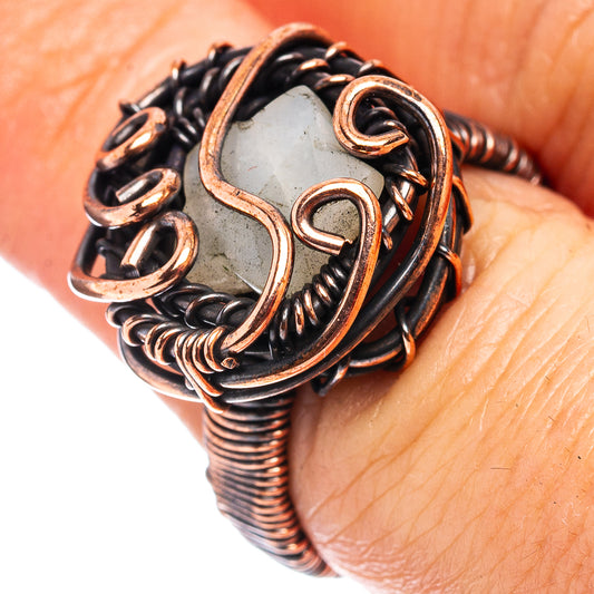 Oxidized copper wire wrap ring with white rainbow moonstone, ornate black and copper wire