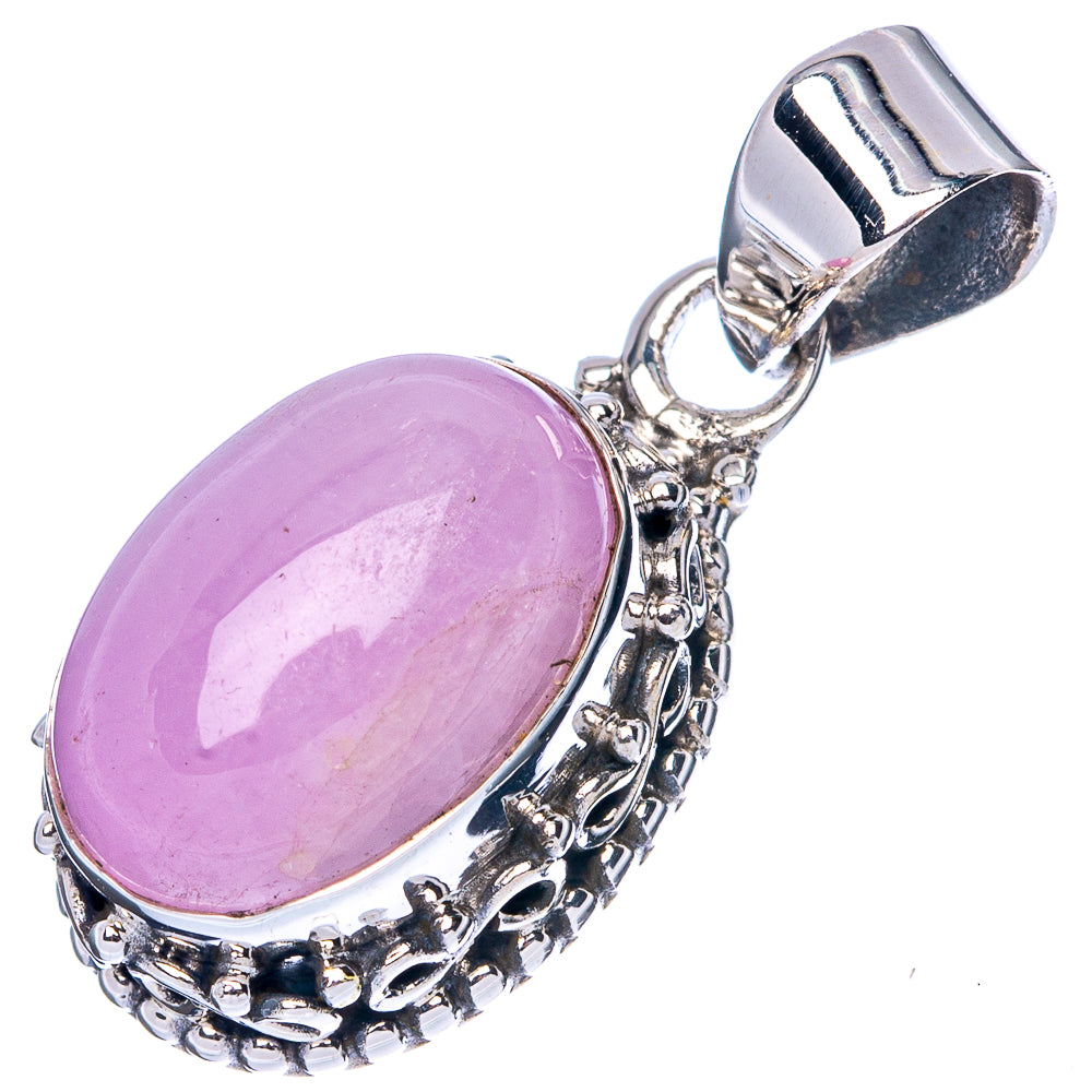 Oval lavender kunzite pendant with detailed silver filigree bezel and oval frame