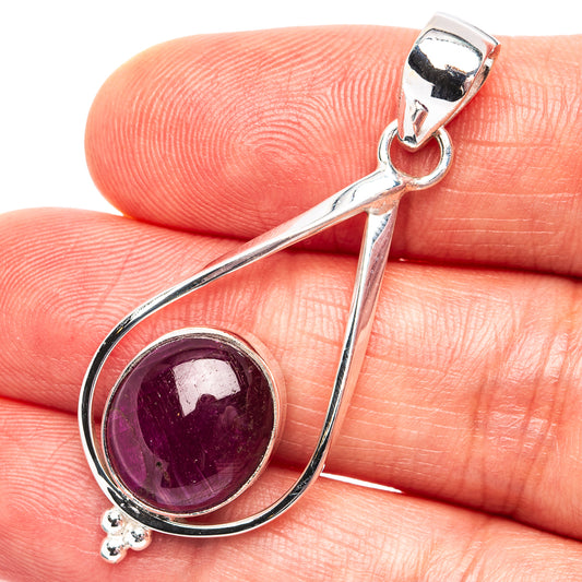 .925 sterling silver ruby pendant with round cabochon in a teardrop setting