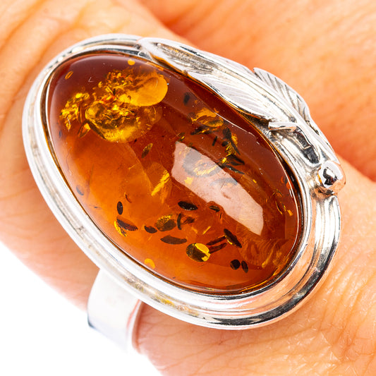 Adjustable oval amber leaf ring, .925 sterling silver bezel and brown cabochon
