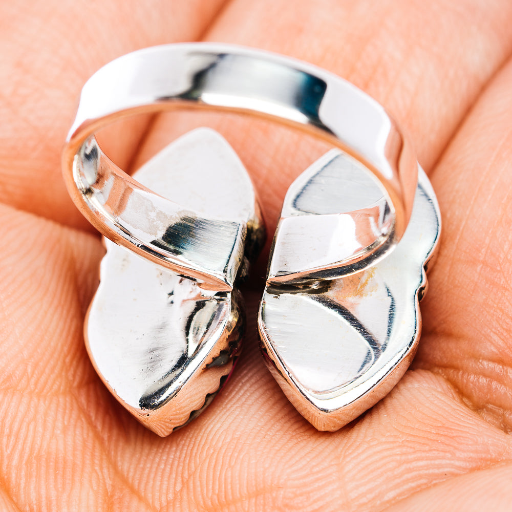 Polished sterling silver adjustable ring band with heart-shaped cutout detail