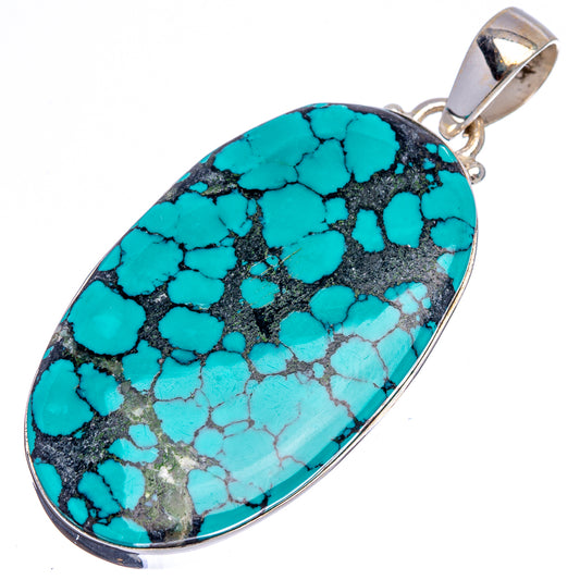 Turquoise oval pendant with black matrix, .925 sterling silver frame and bail
